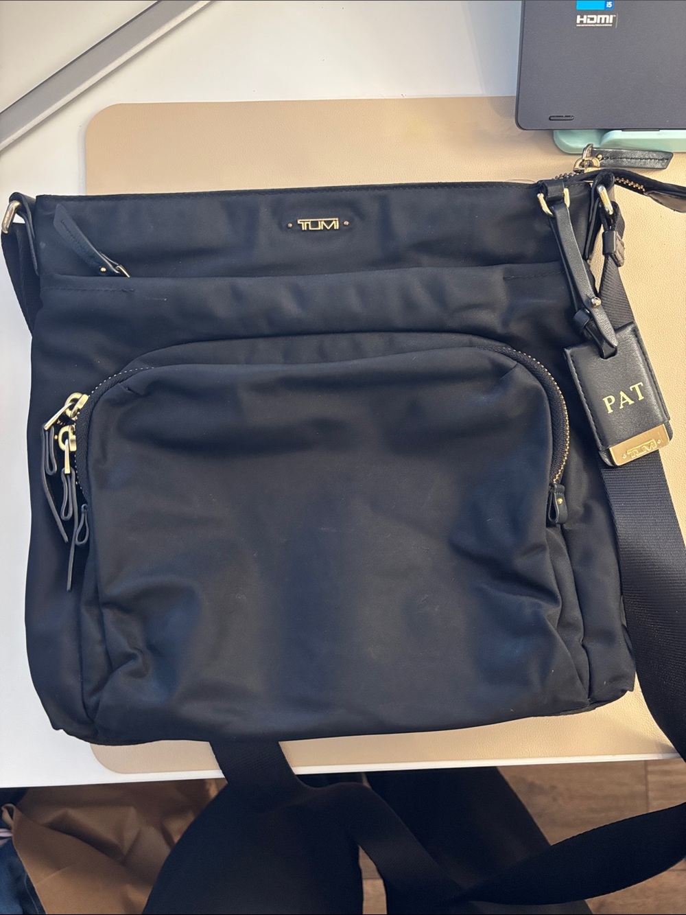 Tumi Black Nylon Messenger Bag with Gold Hardware